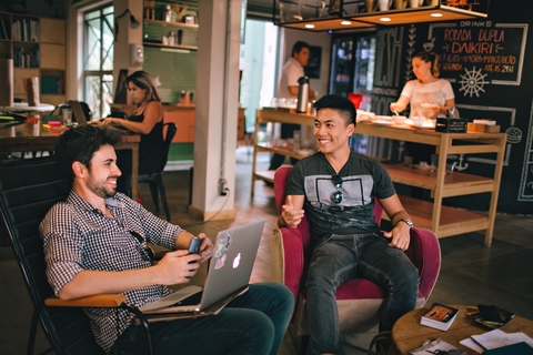 Two Employees Laughing